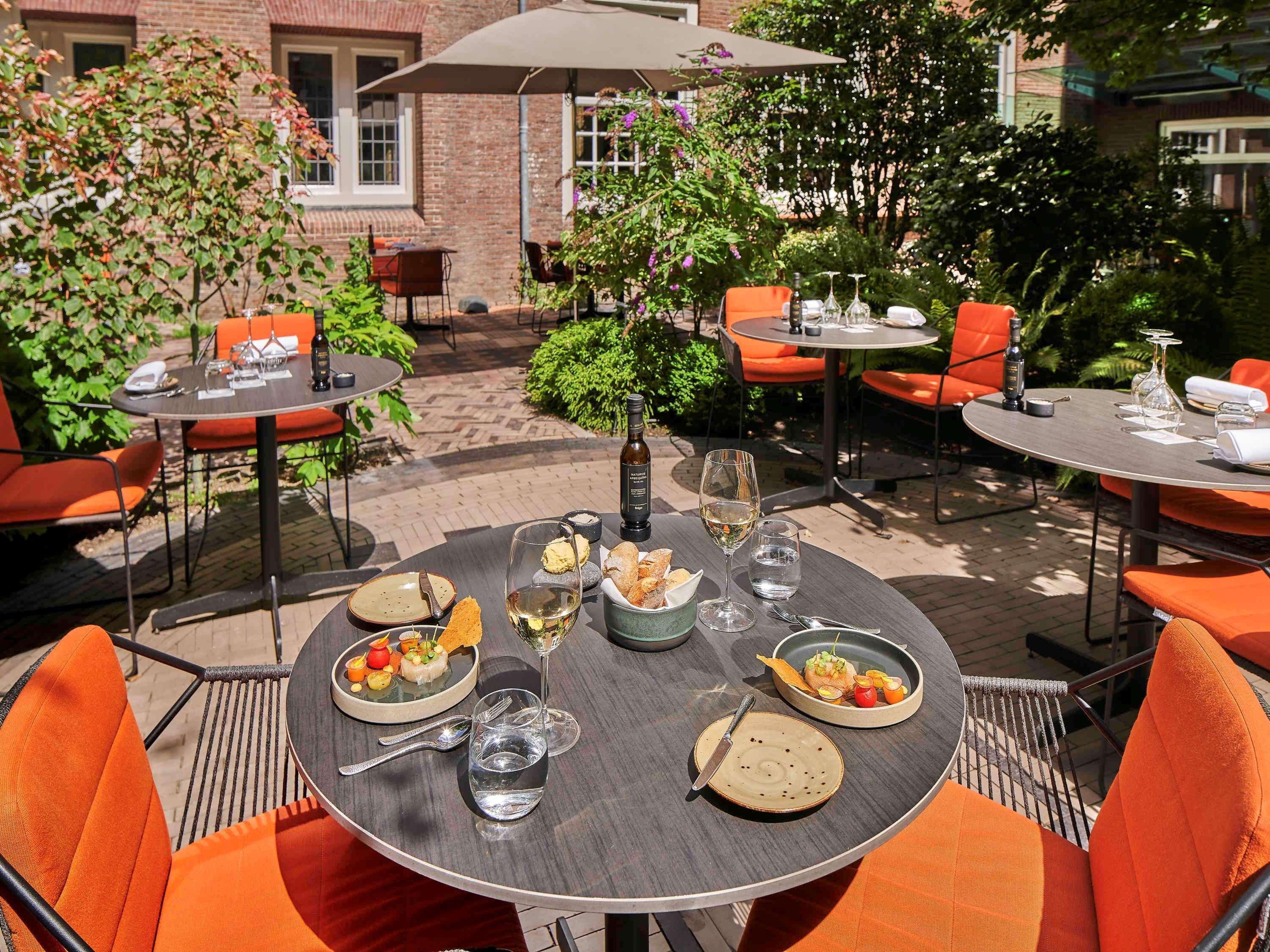 Hotel Sofitel Legend The Grand Amsterdam Esterno foto The restaurant's garden